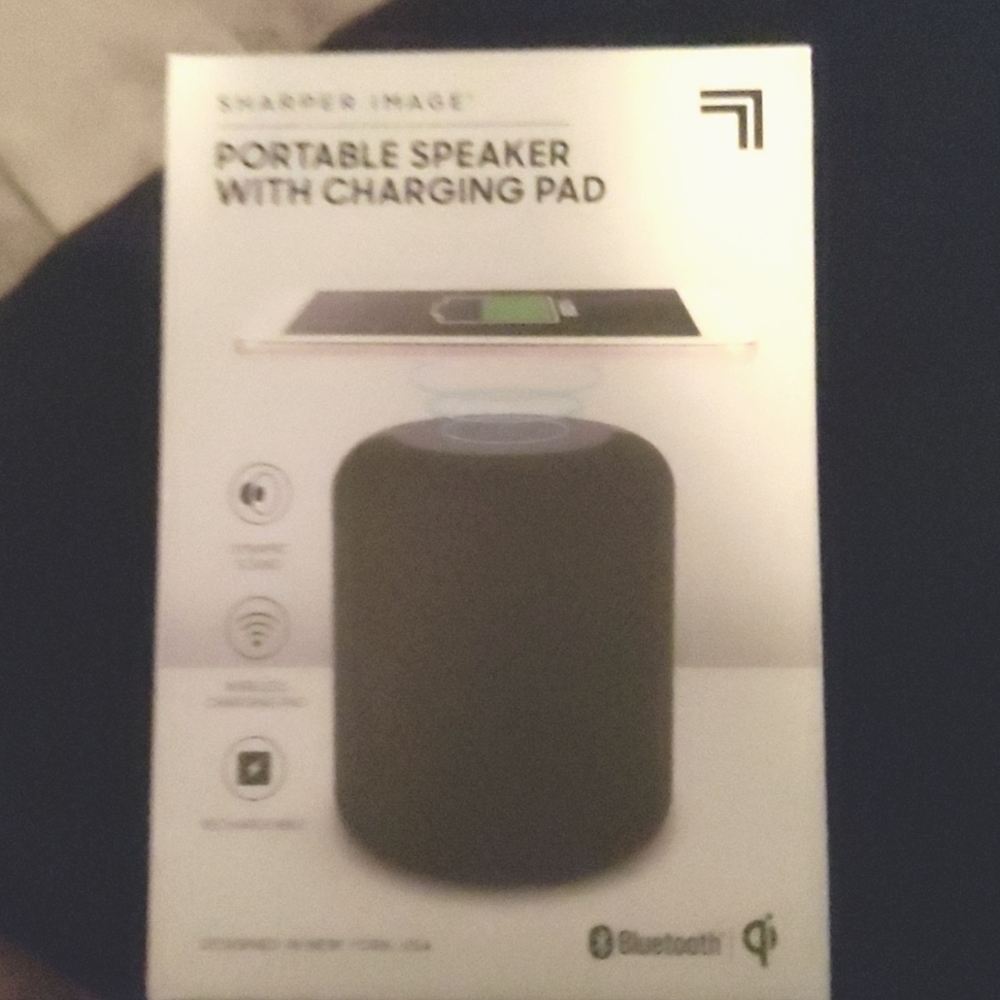 Portable Speaker with Charging Pad